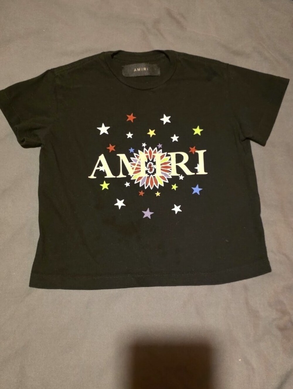 AMIRI Black Tee with Multicolor Starburst Logo